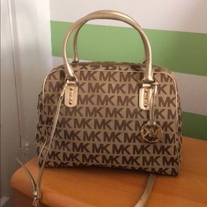 Authentic Michael Kora beige and gold purse